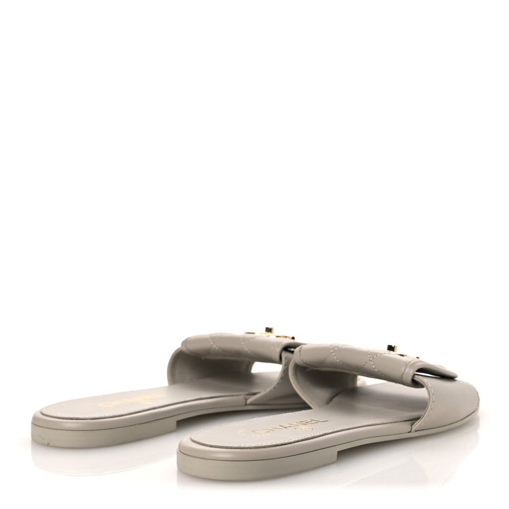 Lambskin Quilted Turnlock Flat Mules 39.5 Light Gray